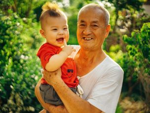 Older Asian Man With Child